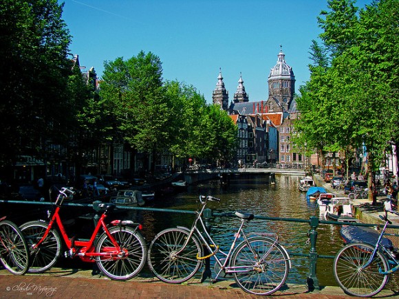 Bikes in Amsterdam by Claudio.Ar (creative commons)